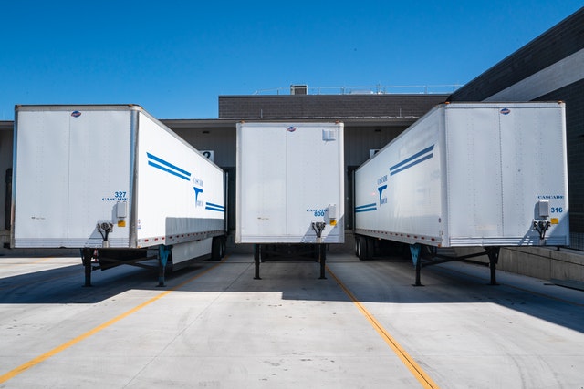 shipping trucks at loading dock